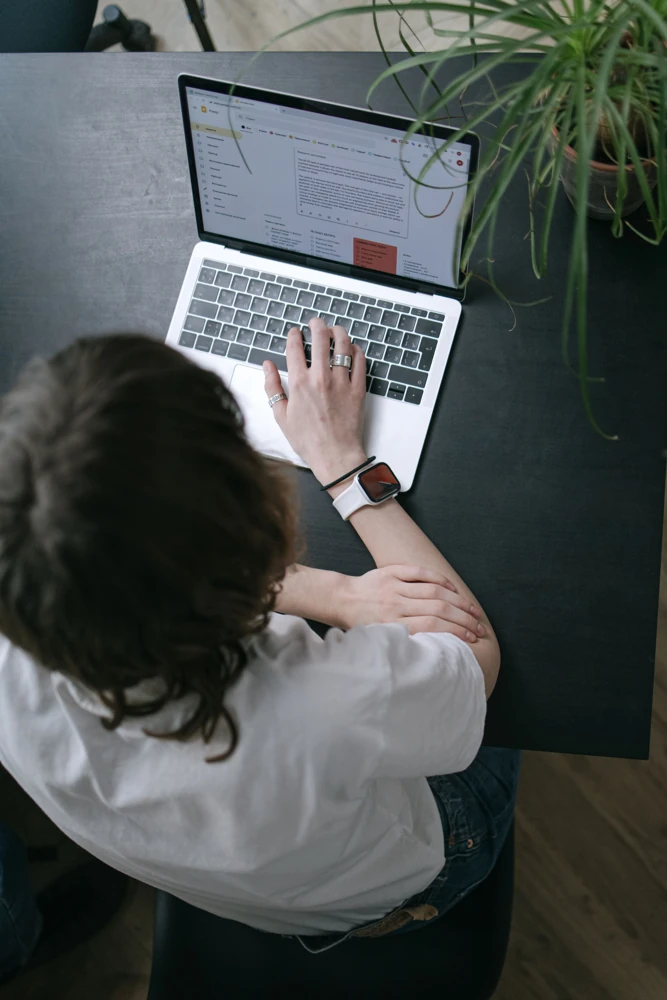 Email account workspace with an inbox open on a laptop